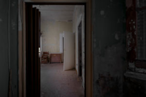 interior of an apartment with abandoned walls, ceilings and floors in the center of a European city interior of an apartment with abandoned walls, ceilings and floors in the center of a European city